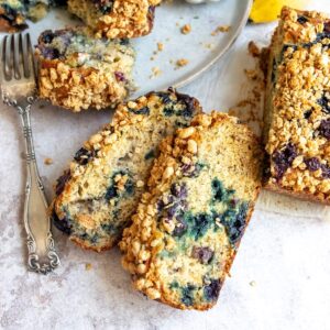 Banana Blueberry Nut Bread on a counter with a fork.