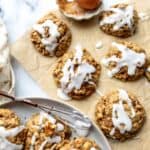 carrot cake cookies on parchment paper.
