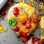 Egg in a bagel hole on a sheet pan