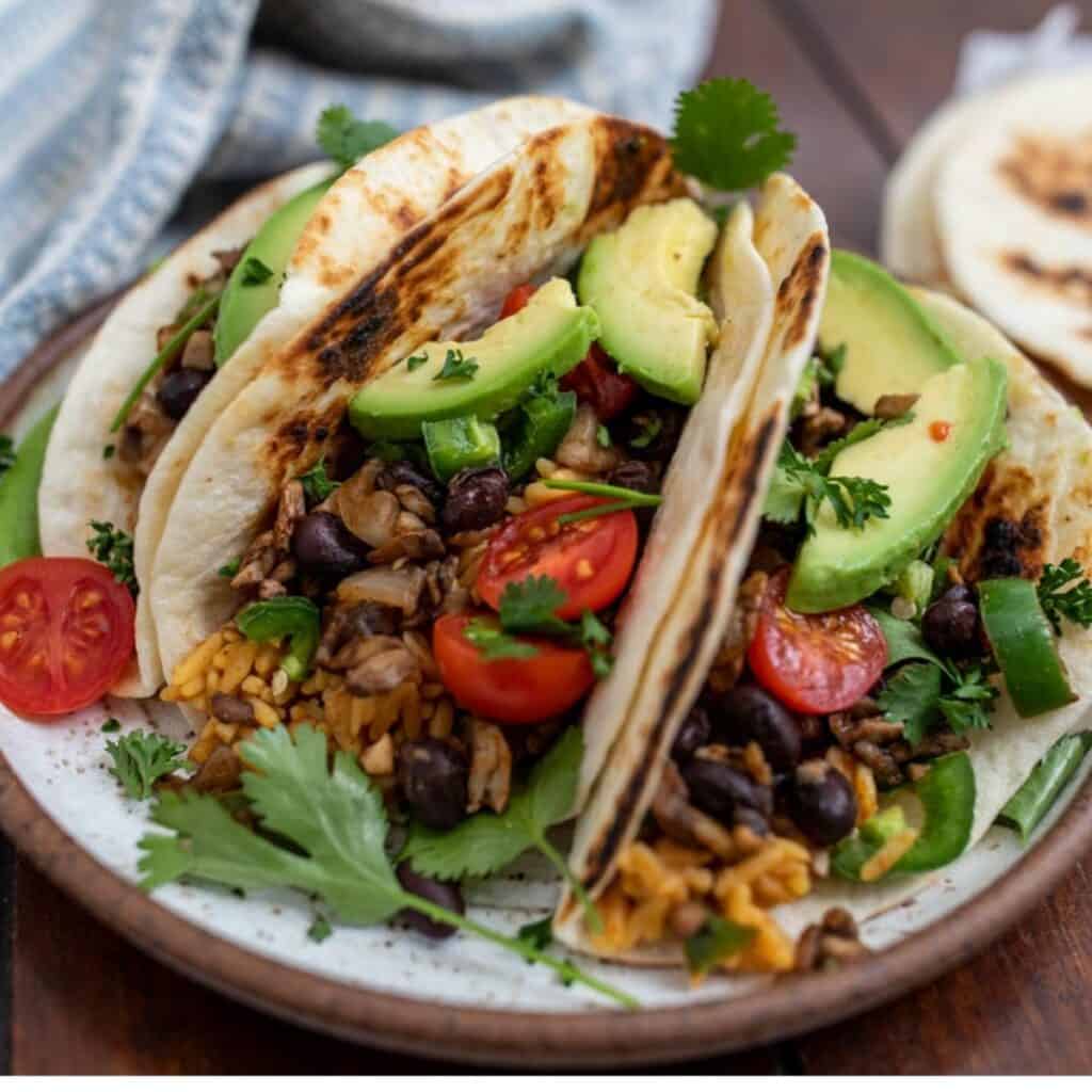 Mushroom Tacos with avocado on top. 