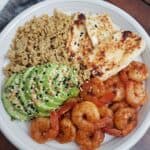 Blackened Shrimp on a white plate.