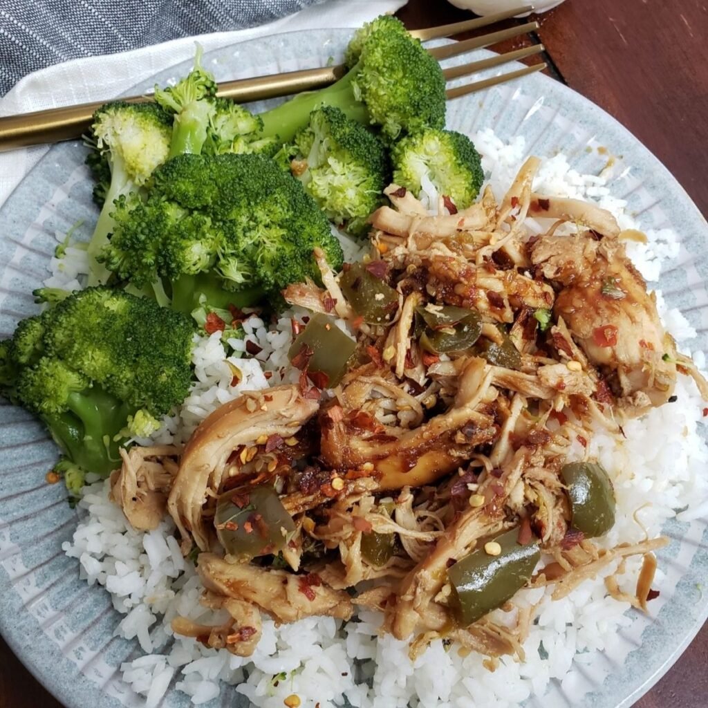 Crock Pot Teriyaki Chicken on rice with broccoli. 