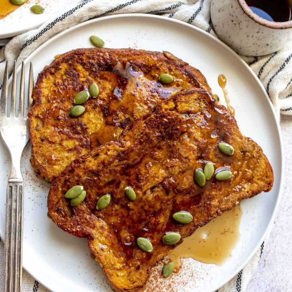 Pumpkin Spice French Toast on a white plate. 