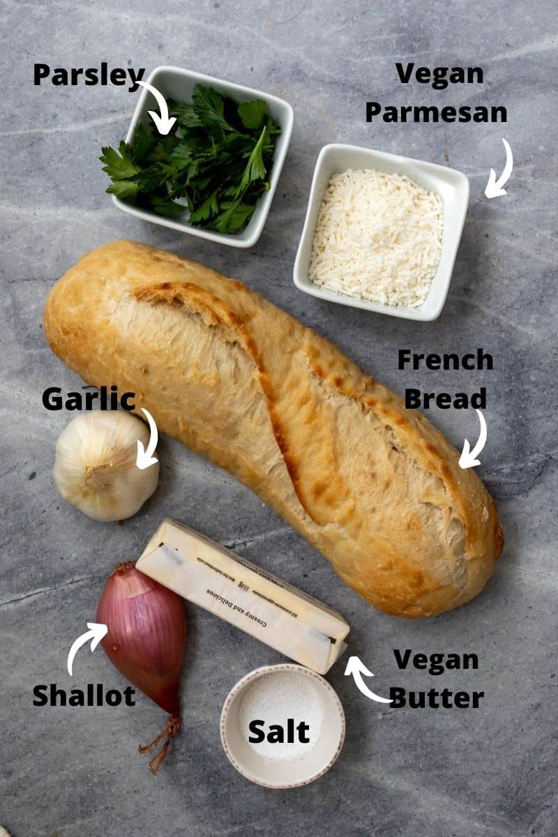 Easy Air Fryer Garlic Bread ingredients on a grey board. 