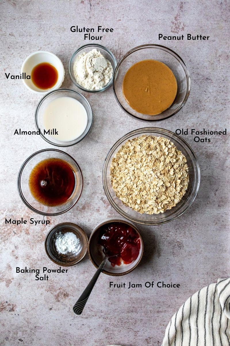Ingredients to make peanut butter jelly bars laid out on a counter. 