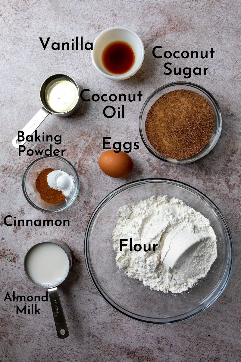 Ingredients on a counter in bowls for cinnamon sugar bread. 