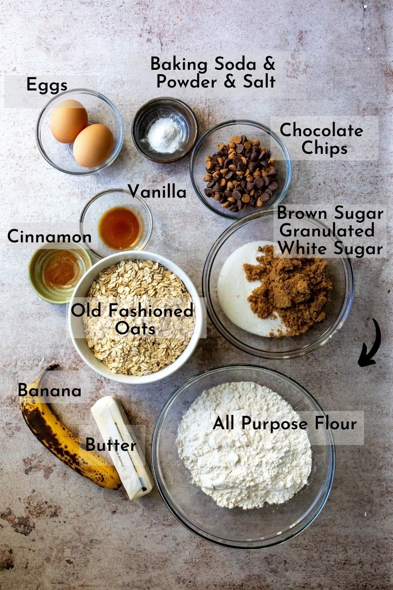 Ingredients for soft oatmeal cookies in bowls on a counter. 
