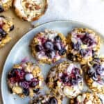 Blueberry oat cookies with icing on top.