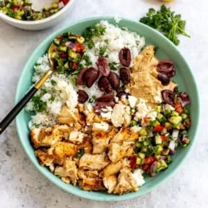 Close up of Mediterranean bowls in a green bowl.