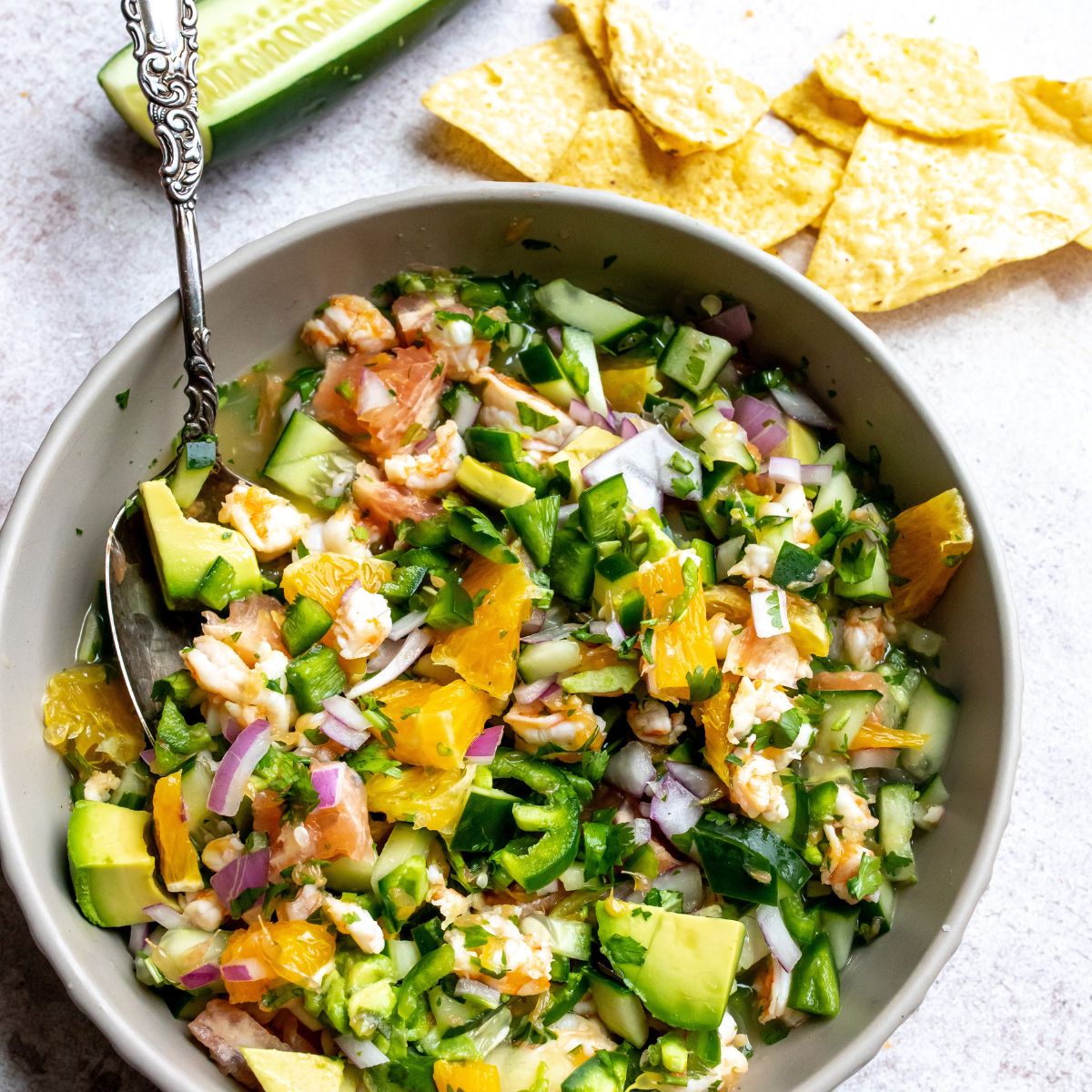 Easy Citrus Mexican Shrimp Ceviche in a bowl with a spoon.