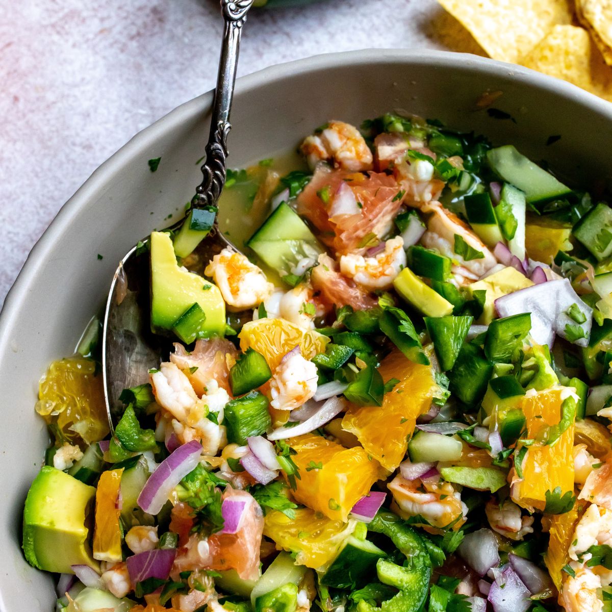 Mexican shrimp ceviche up close in a bowl. 