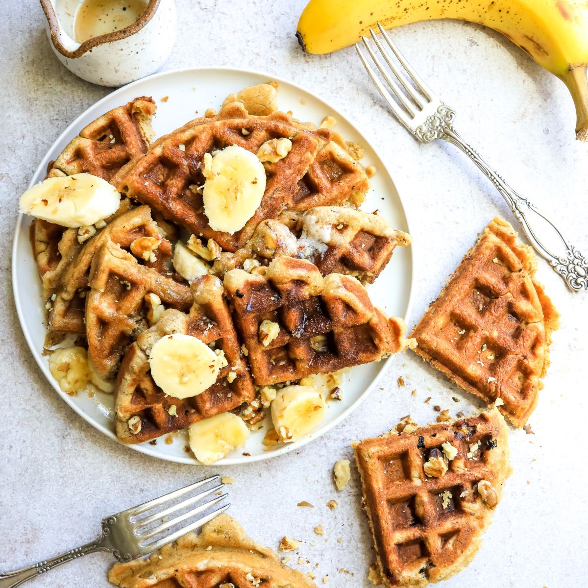 Banana Bread Waffles on a plate with forks. 