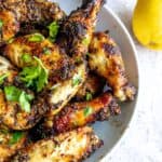 Air Fryer Lemon Pepper Wings in a white bowl.