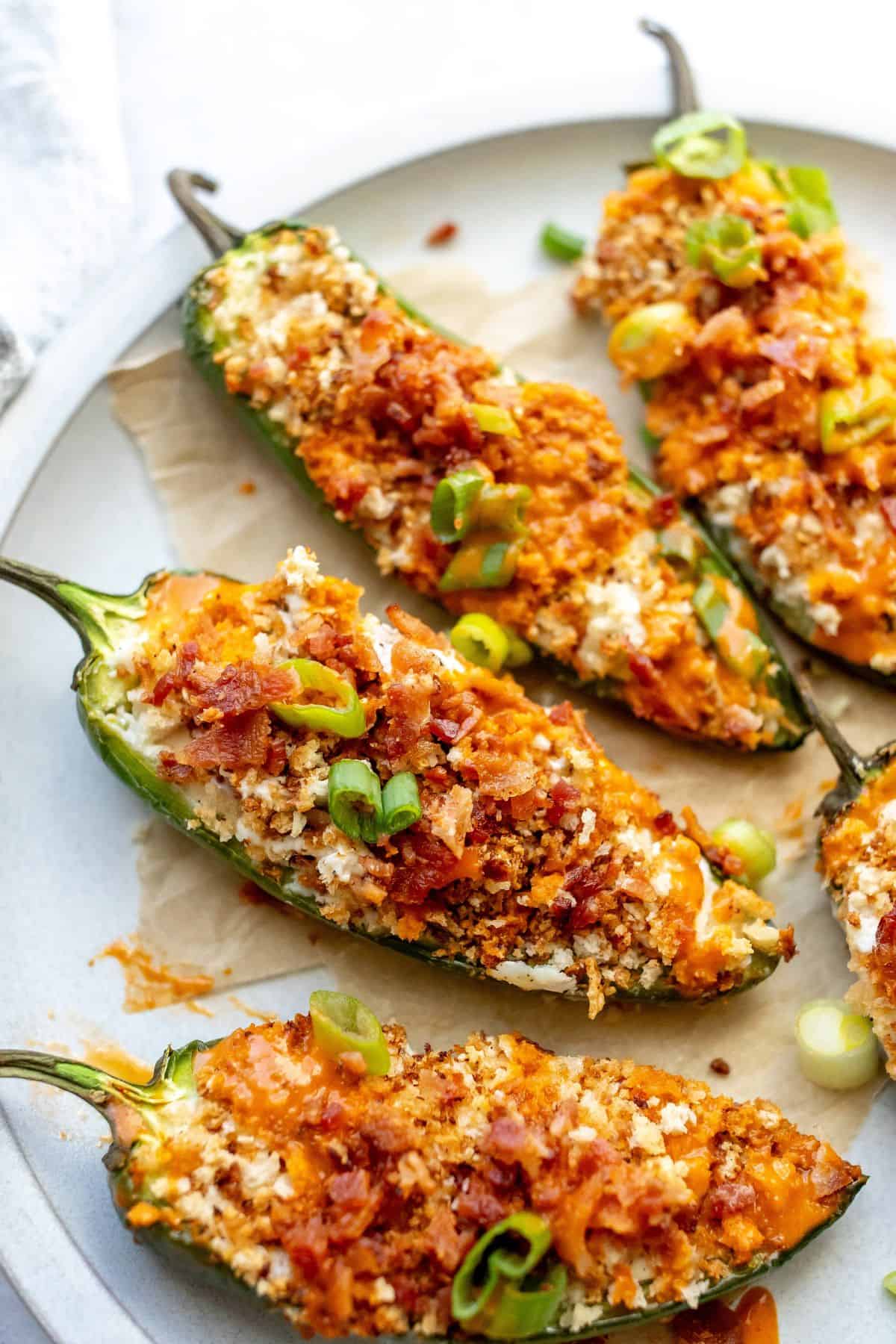 oven Baked Jalapeño Poppers on a plate up close, overhead shot.