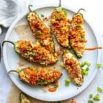 oven Baked Jalapeño Poppers on a plate up close, overhead shot.