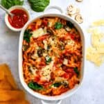 Baked Penne Pasta up close in a baking dish.