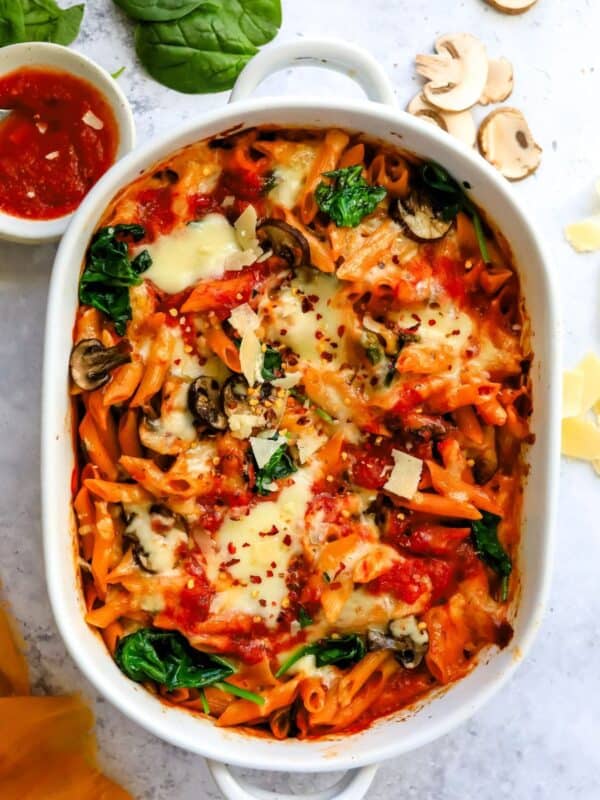 Baked Penne Pasta up close in a baking dish.