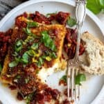 Pan Fried Feta on a plate with a fork.