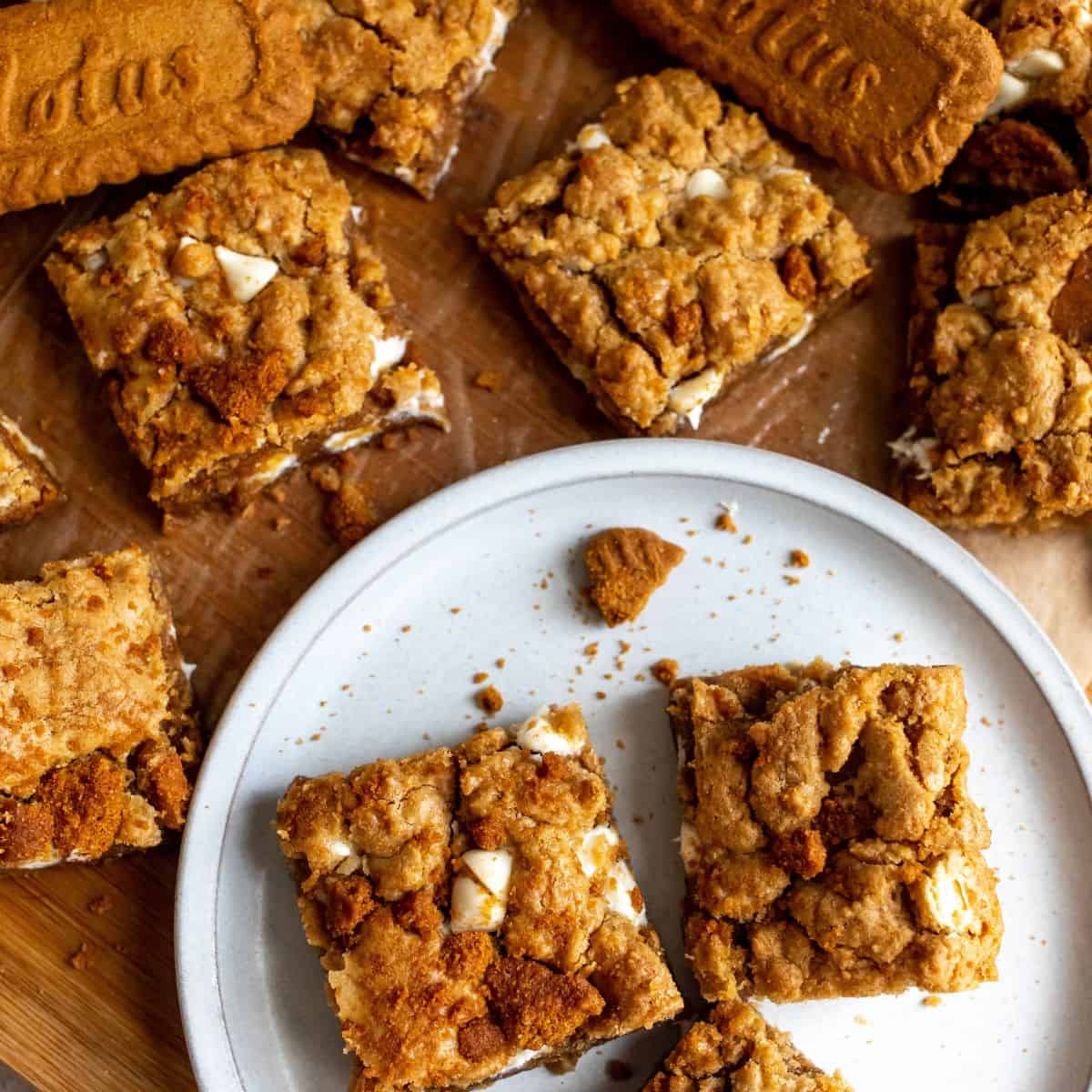 Biscoff Blondies up close on a white plate.