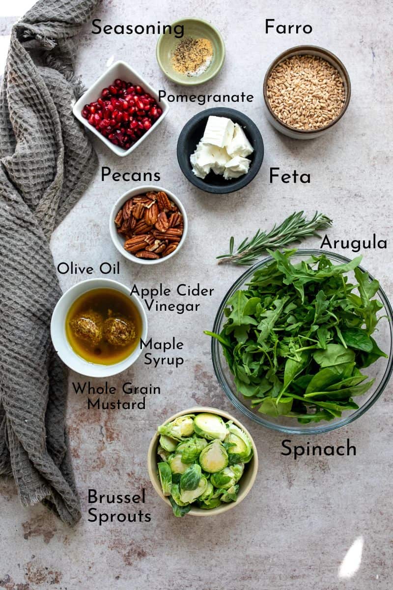 Fall Salad ingredients on a board in a bowls. 