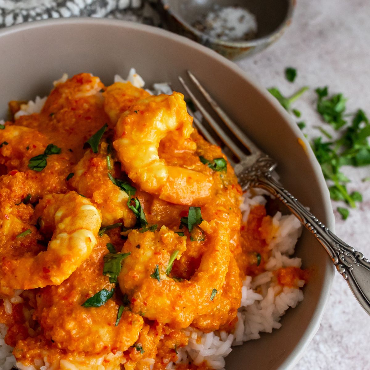 Coconut Shrimp Curry in a grey bowl.