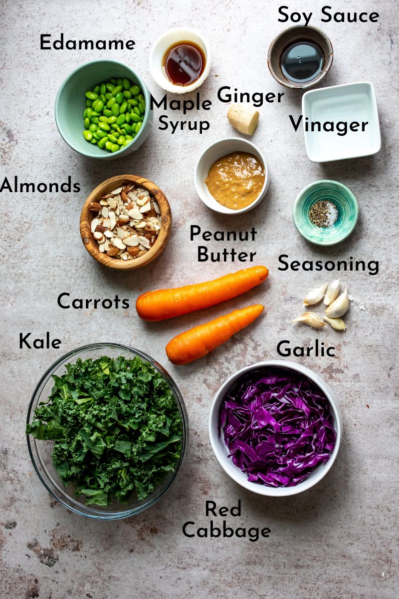 Ingredients to make this salad all on a counter in clear and white bowls. 