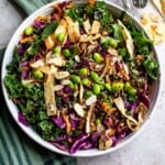 White ceramic bowl with asian cabbage salad recipe in it.