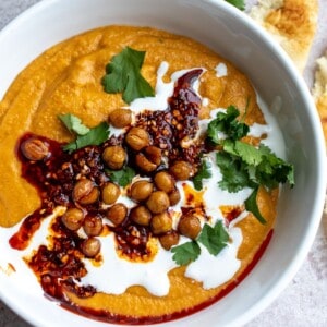 Soup in a white bowl up close.