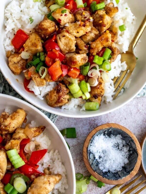 Crispy Chicken with salt and pepper seasonings served over rice with veggies.