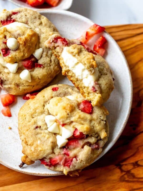 White plate with Strawberry Cheesecake Cookies on it.