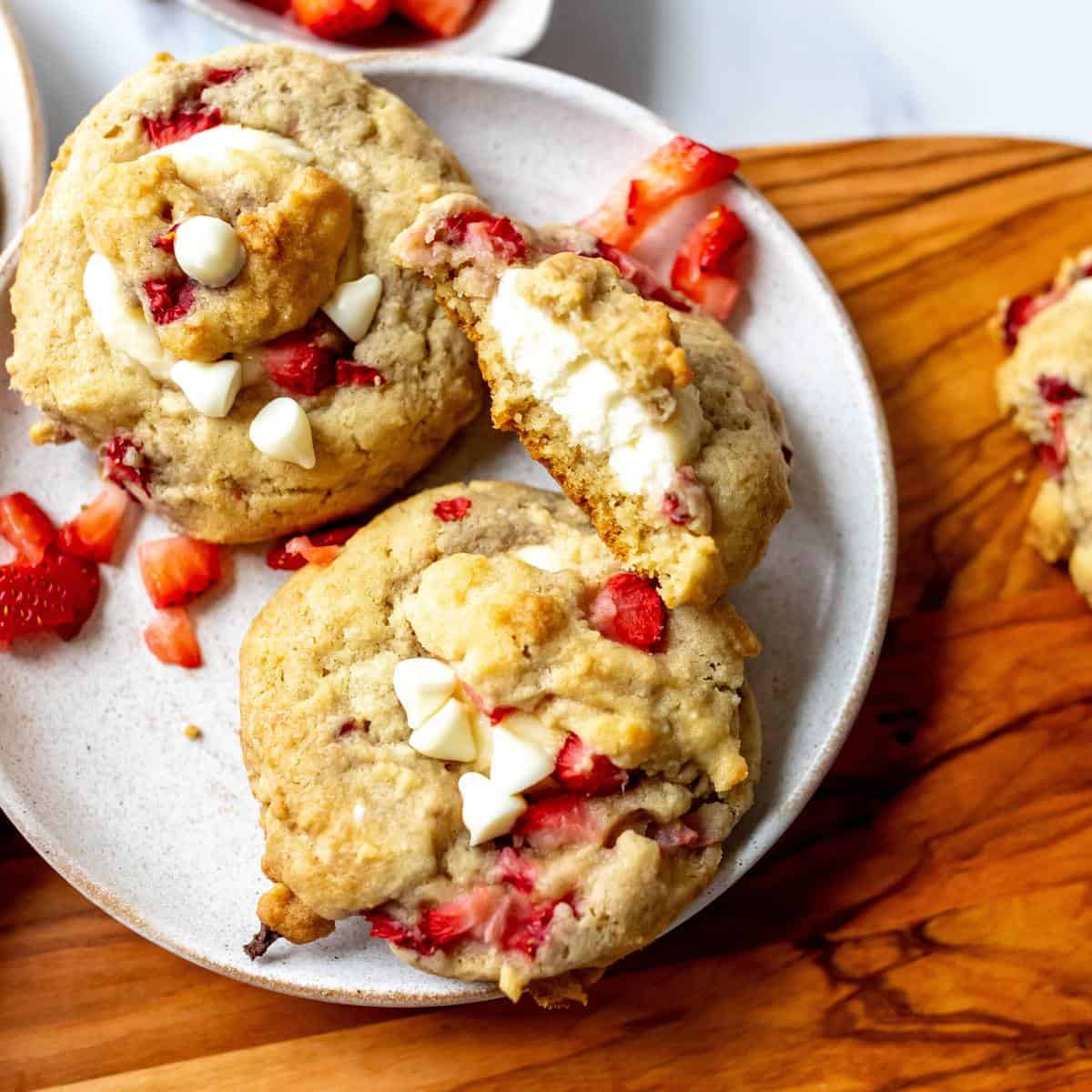 White plate with Strawberry Cheesecake Cookies on it.