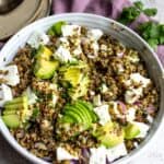 White bowl with lentil salad and feta.