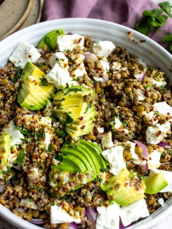 White bowl with lentil salad and feta.