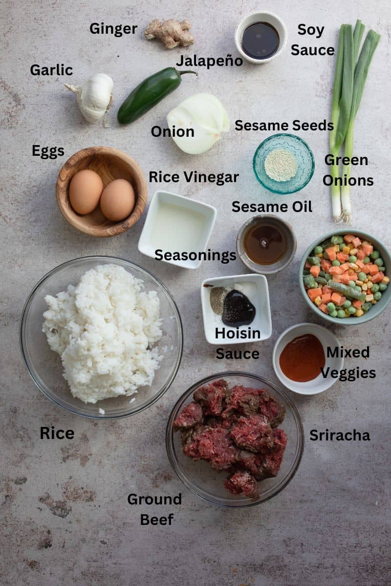 Ingredients used to make this beef fried rice recipe on a counter before cooking.