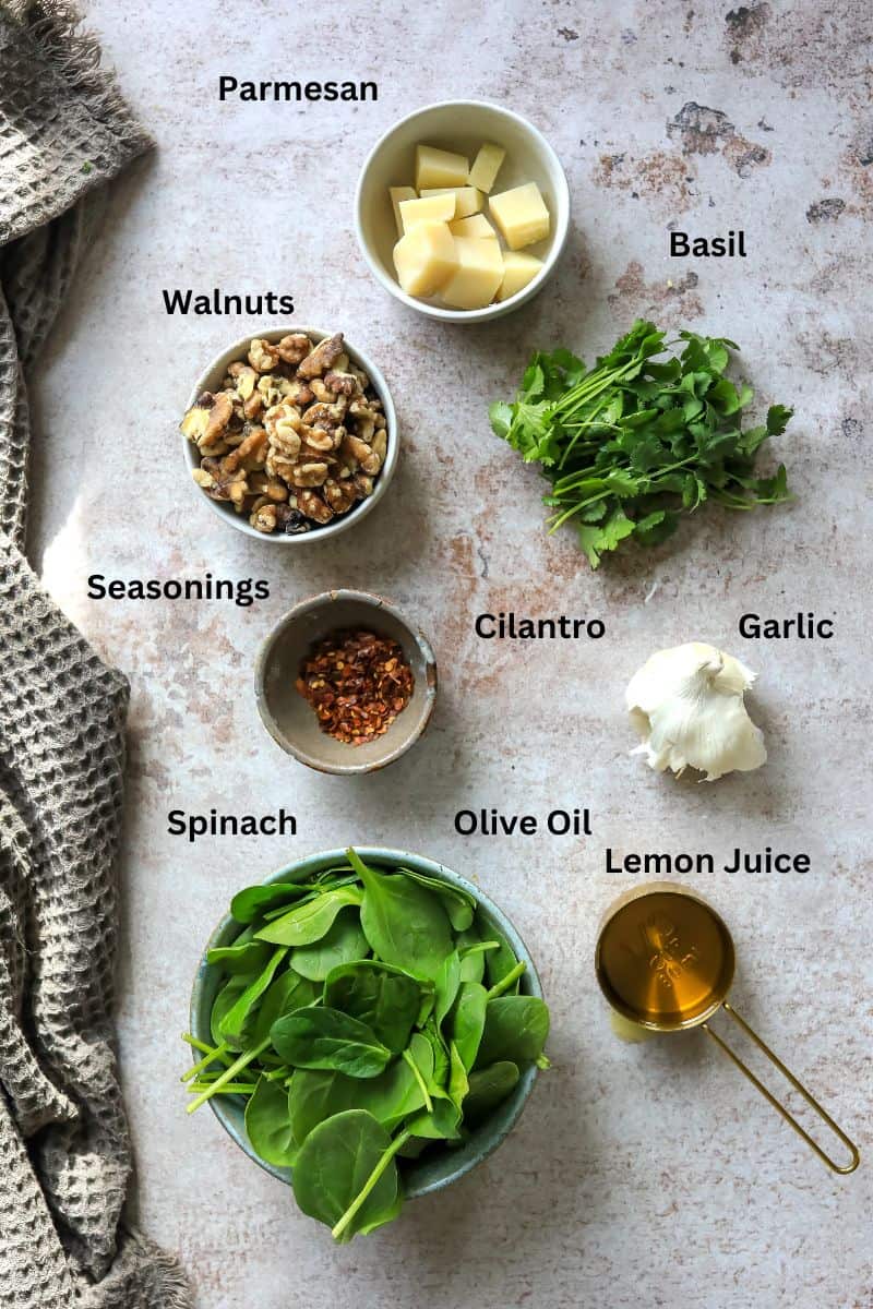 All ingredients needed in small bowls on a counter. 