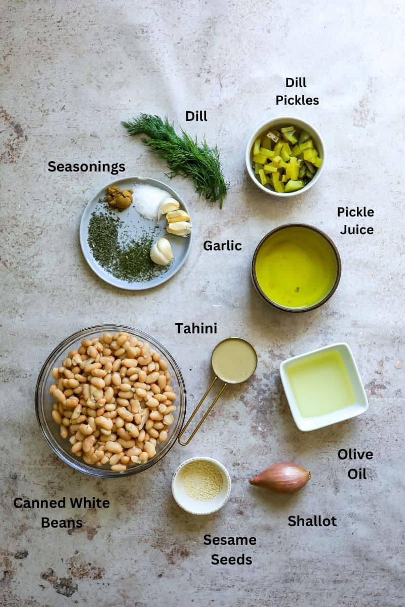Ingredients to make dill pickle hummus on the table before making.