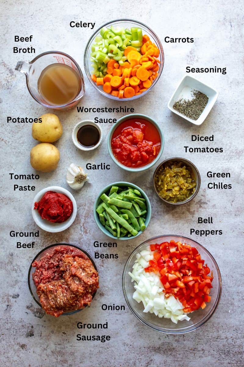 Small bowls and plates with ingredients in them. Fresh veggies and seasoning. 