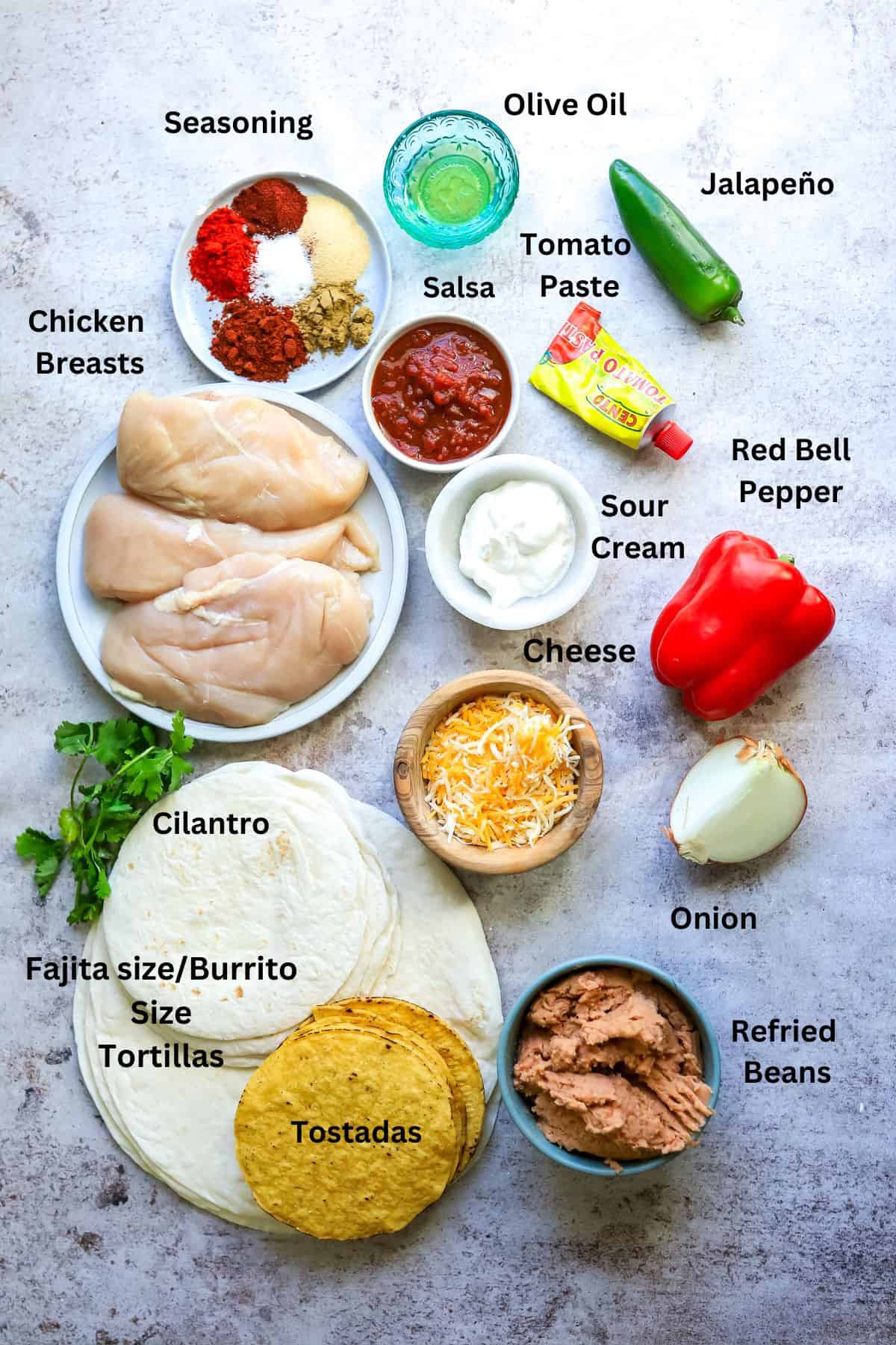 Small bowls and plates with ingredients.