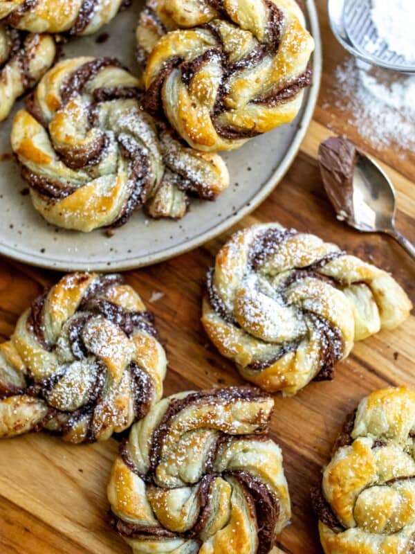 Pastries with Nutella swirled in them on a plate.