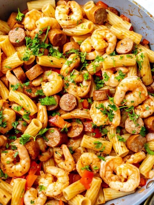 Cajun Shrimp And Sausage Pasta in a grey pan.