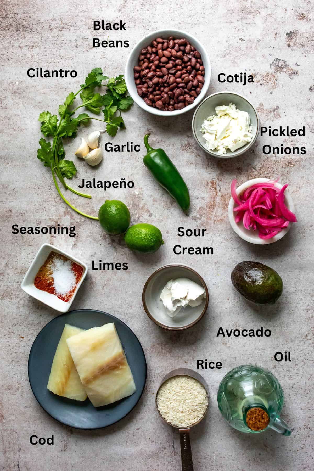 All ingredients on a counter on small plates and bowls.