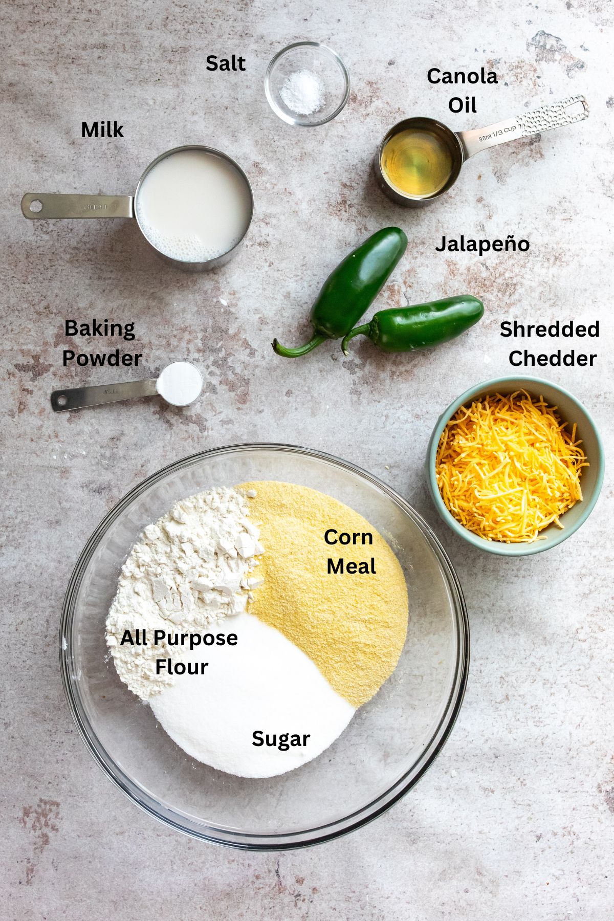 Ingredients needed to make the recipe in measuring cups and bowls. 