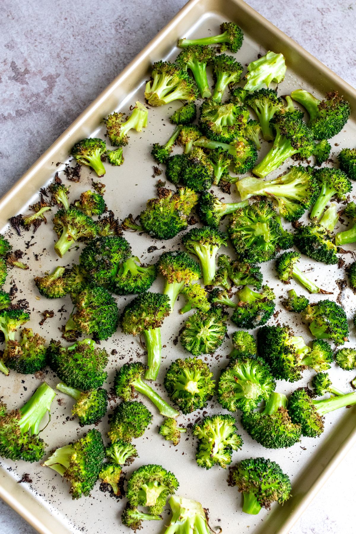 Charred Broccoli on a baking sheet. 
