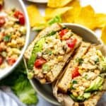 Chickpea Salad Sandwiches in a bowl wrapped in parchment paper.