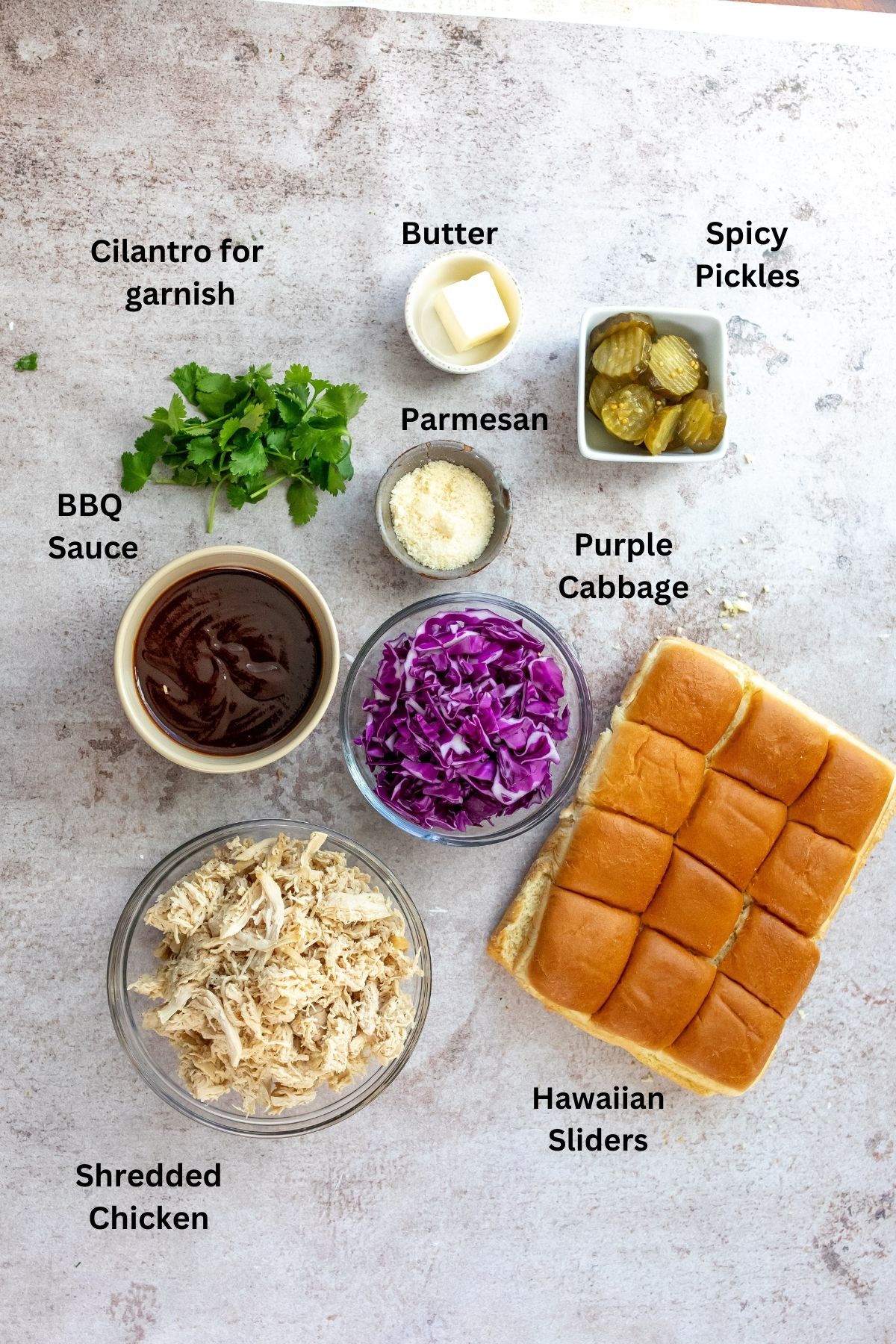 Ingredients needed to make the sliders, BBQ Sauce, Chicken and more. 