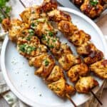 Garlic Parmesan Chicken Skewers on a plate.