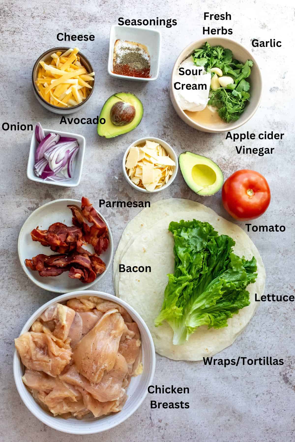Ingredients on a counter in bowls and plates. 