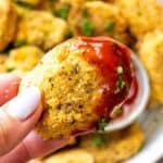 Chicken nugget with ketchup on it.
