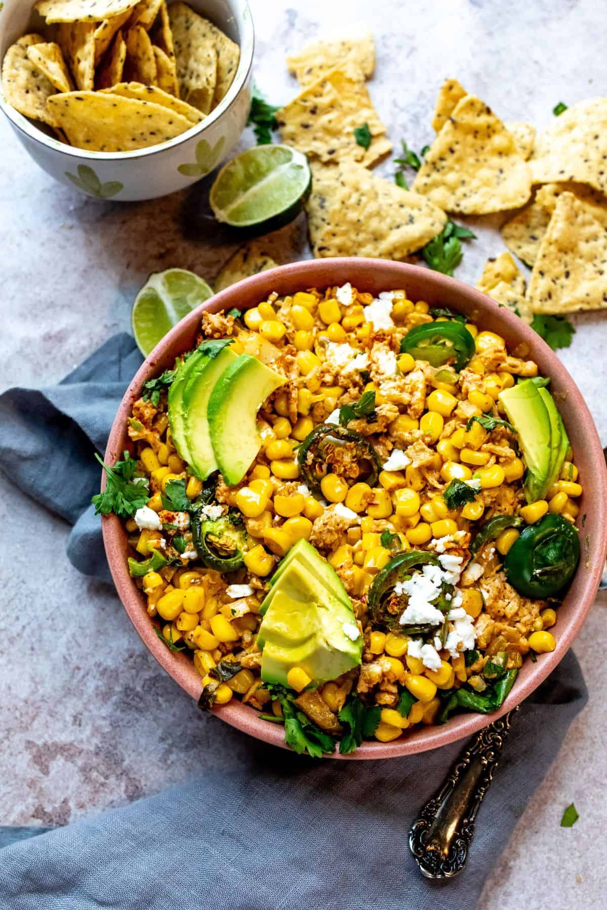 An image of Mexican street corn casserole in a serving bowl.