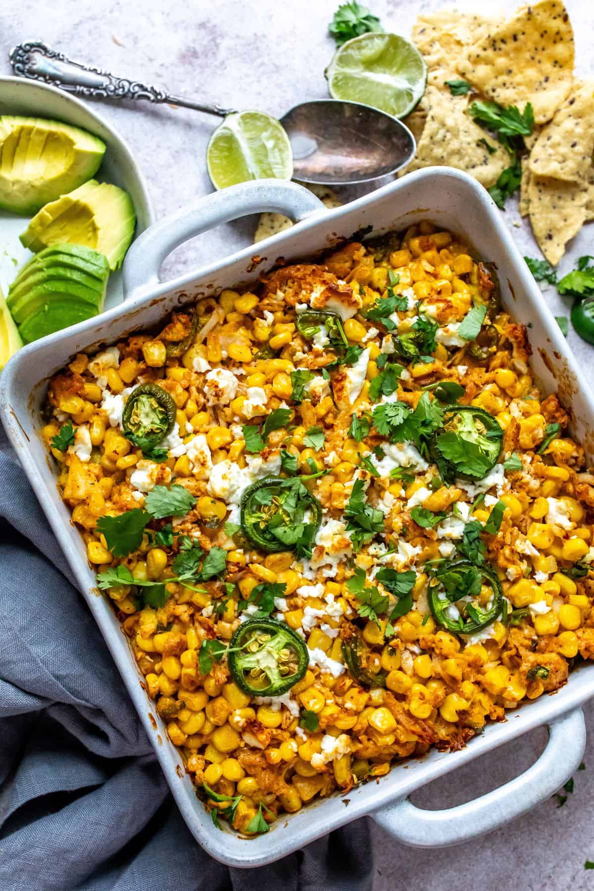 An image of Mexican street corn casserole in a baking dish.